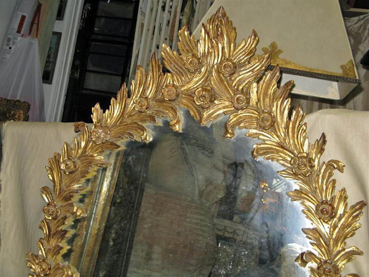 Unique Italian Carved Giltwood Mirror