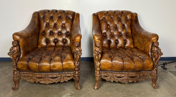 Pair of Italian Leather Tufted Armchairs w/ Cherubs