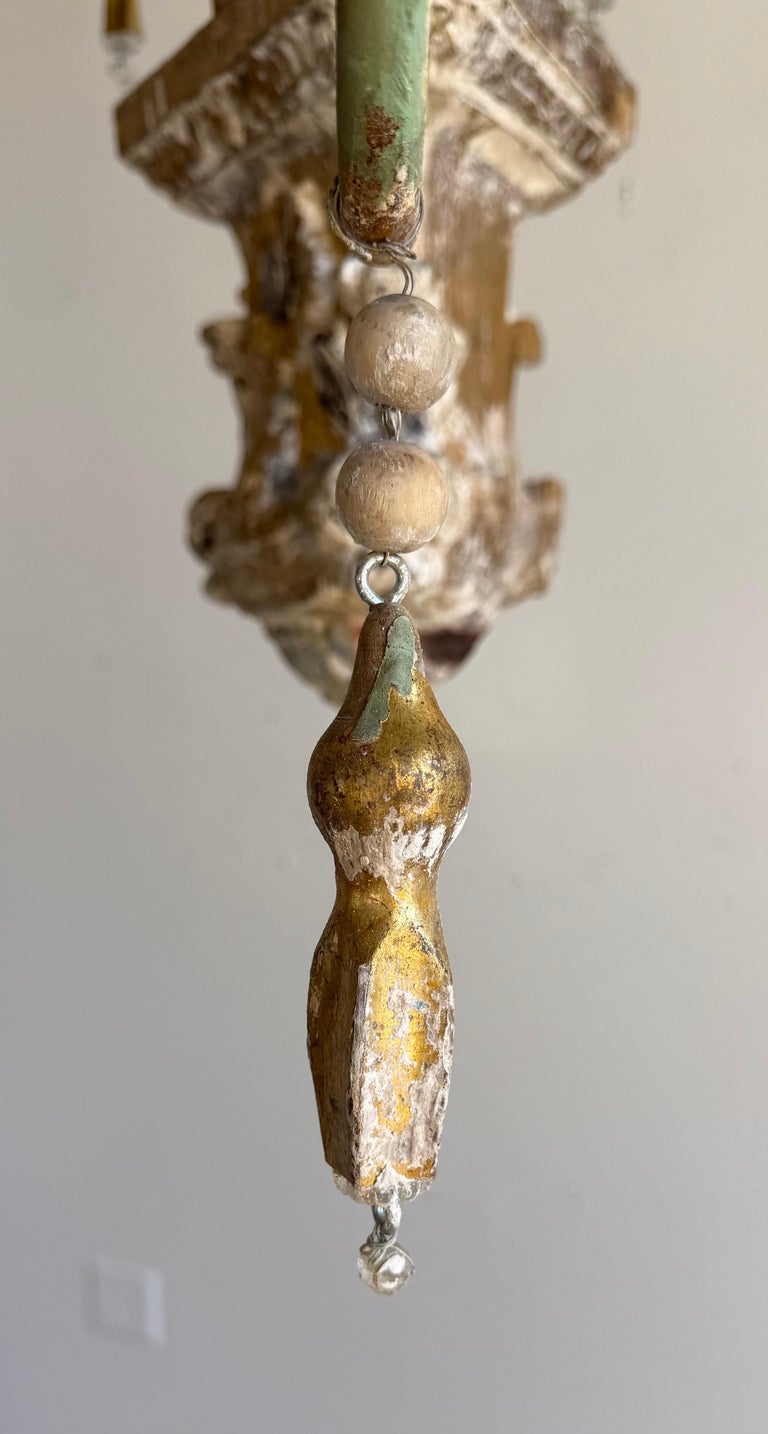 Grand Italian Painted and Giltwood Twelve-Light Chandelier