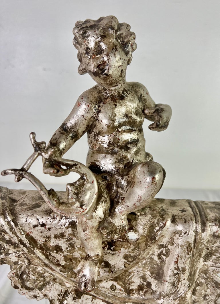 Pair of French Silvered Gilt Metal Cherubs on Lucite Bases