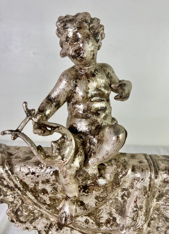 Pair of French Silvered Gilt Metal Cherubs on Lucite Bases