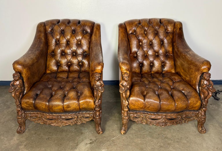 Pair of Italian Leather Tufted Armchairs w/ Cherubs