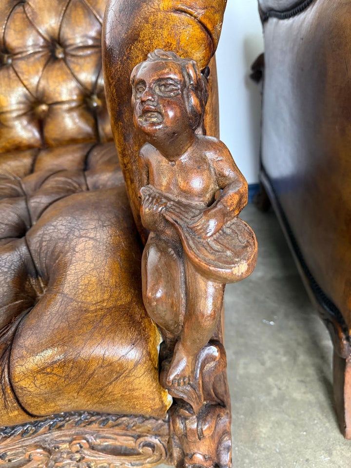 Pair of Italian Leather Tufted Armchairs w/ Cherubs