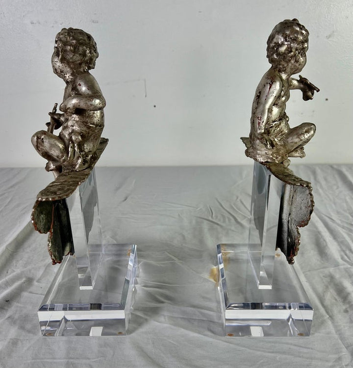 Pair of French Silvered Gilt Metal Cherubs on Lucite Bases