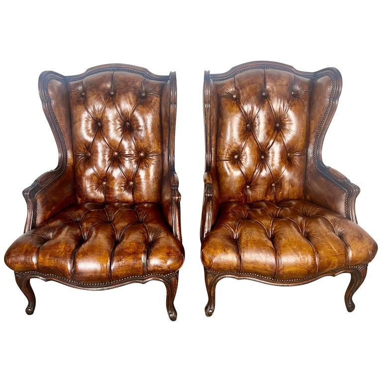 Pair of French Leather Tufted Wingback Chairs C. 1930