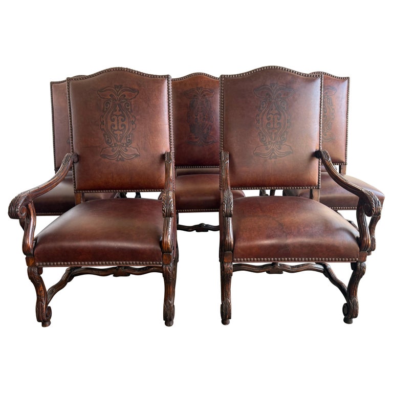 Set of Eight Spanish Revival Leather and Carved Walnut Dining Chairs