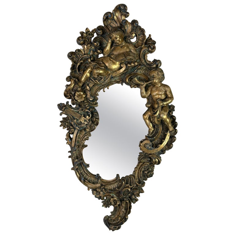 19th Century Italian Rococo Giltwood Figural Mirror