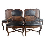 Eight French Provincial-style dining chairs