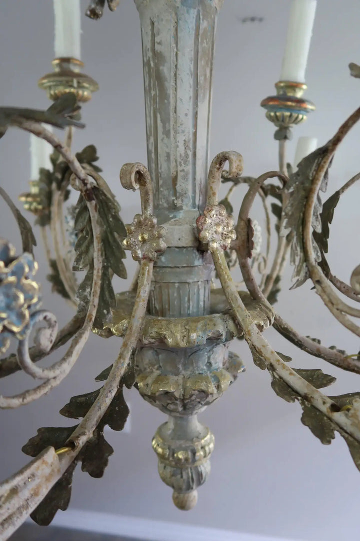 Twelve-Light Italian Wood and Iron Cherub Trio Chandelier,  $4,800 each/ not for the pair