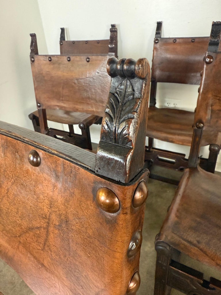 Set of Six Spanish Revival Leather and Carved Wood Armchairs
