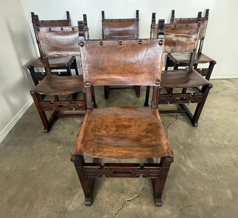 Set of Six Spanish Revival Leather and Carved Wood Armchairs