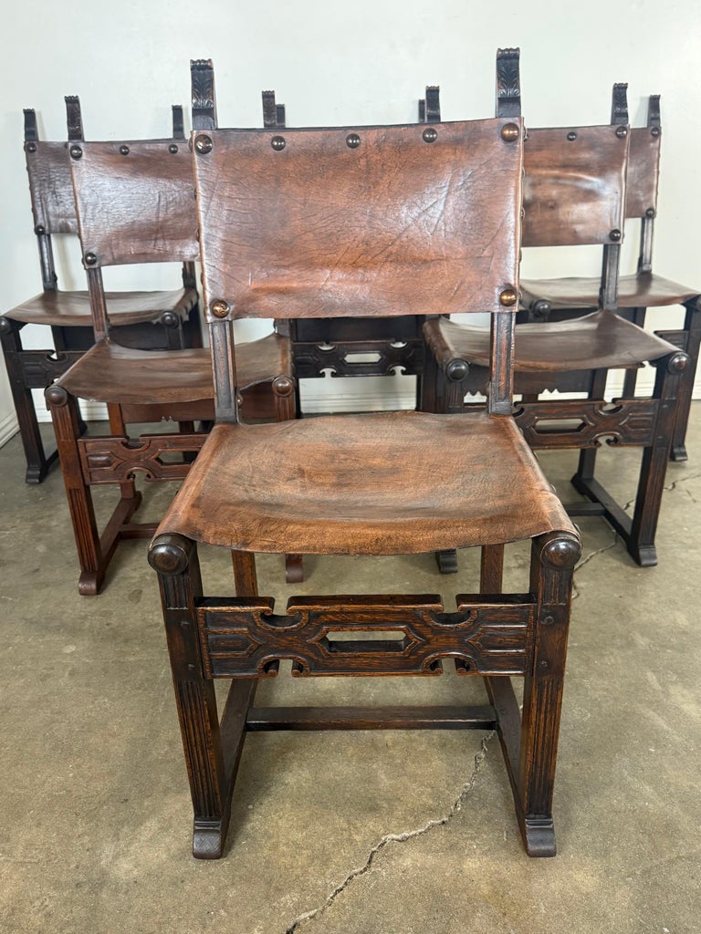 Set of Six Spanish Revival Leather and Carved Wood Armchairs