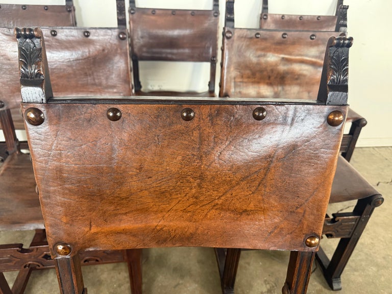 Set of Six Spanish Revival Leather and Carved Wood Armchairs