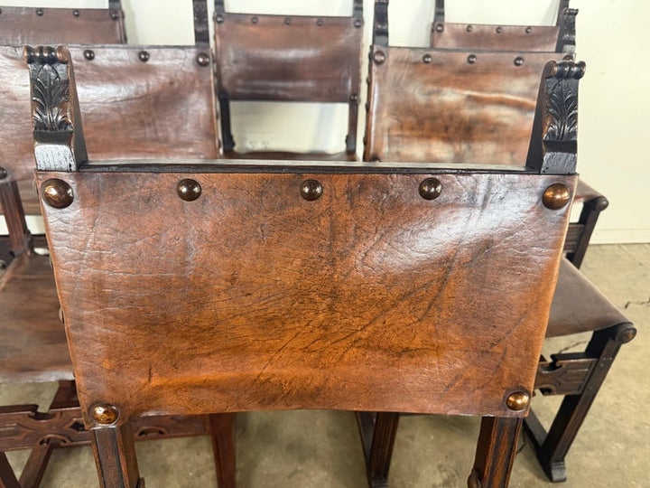 Set of Six Spanish Revival Leather and Carved Wood Armchairs