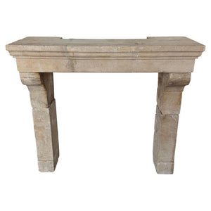 Petite 18th Century French Limestone Fireplace Mantel With Scrolled Corbels