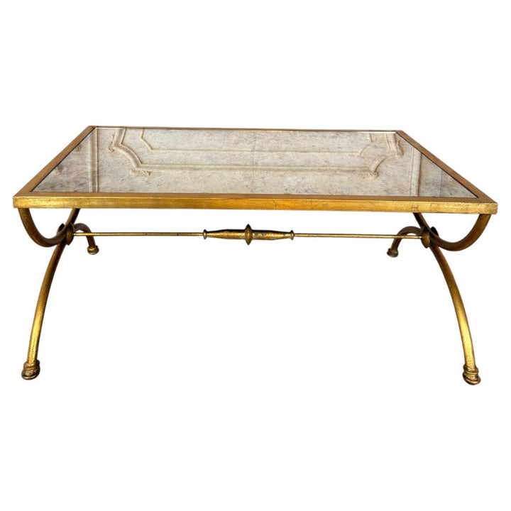 Curule Gilt Iron Coffee Table with Antiqued Mirror Top by Miamar Home