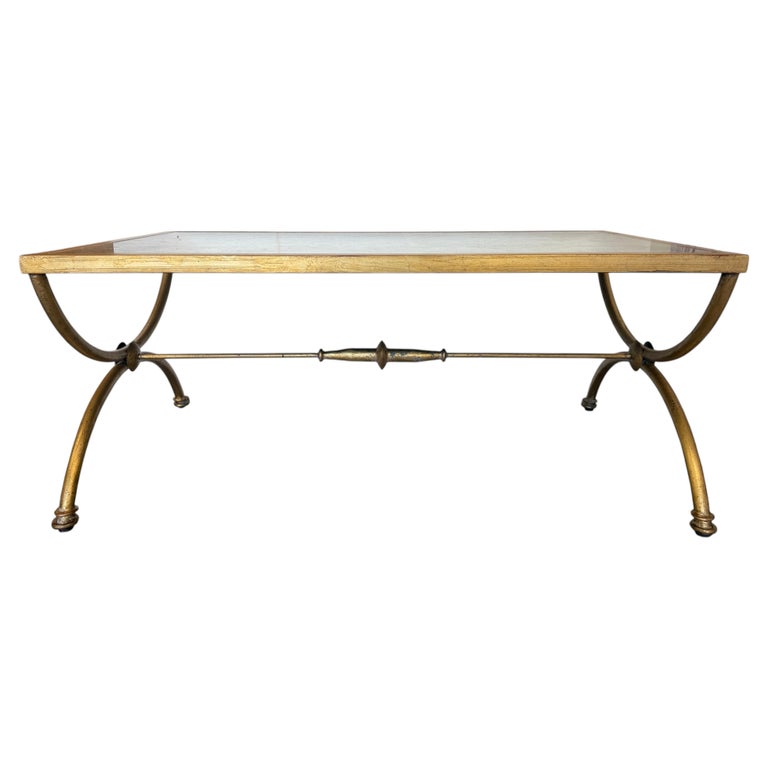 Curule Gilt Iron Coffee Table with Antiqued Mirror Top by Miamar Home
