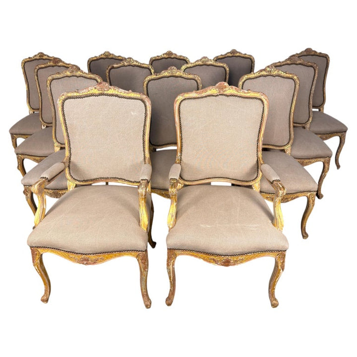 Set of 14 French Louis XV Style Gilt Dining Chairs with Linen Upholstery