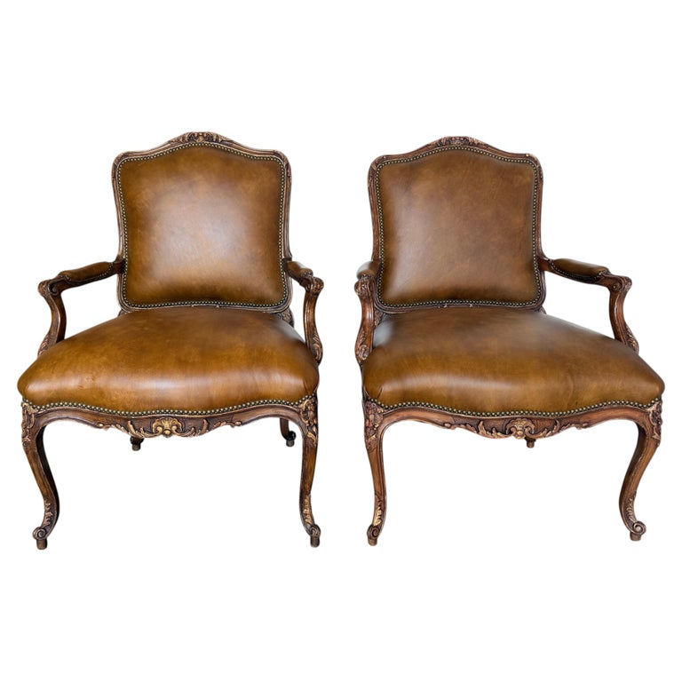Pair of VIntage French Louis XV Cognac Leather Fauteuils