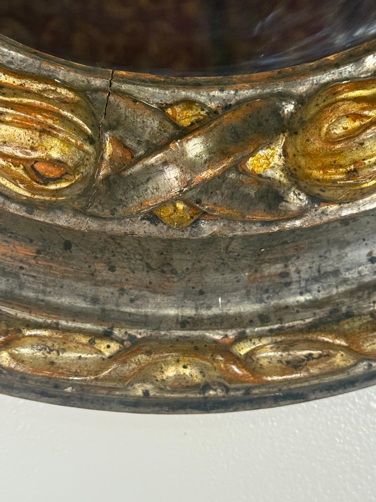 19th Century Italian Oval Mirror in Burnished Silver Leaf and Gold