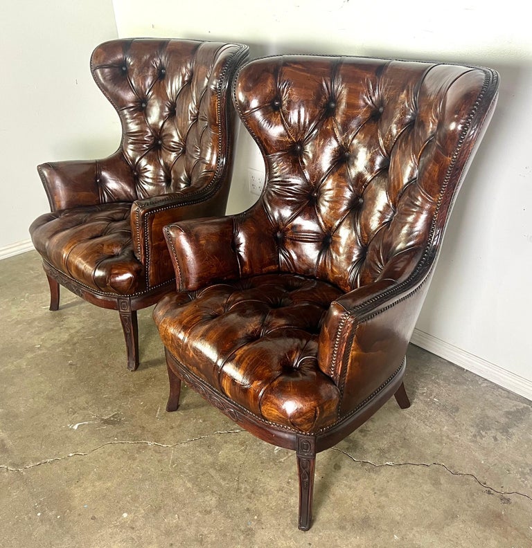 Pair of 19th Century English Leather Tufted Armchairs