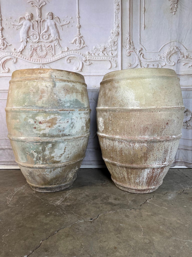 Pair of Antique Mediterranean Terracotta Storage Jars with Weathered Patina