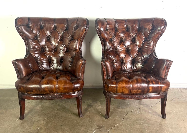 Pair of 19th Century English Leather Tufted Armchairs