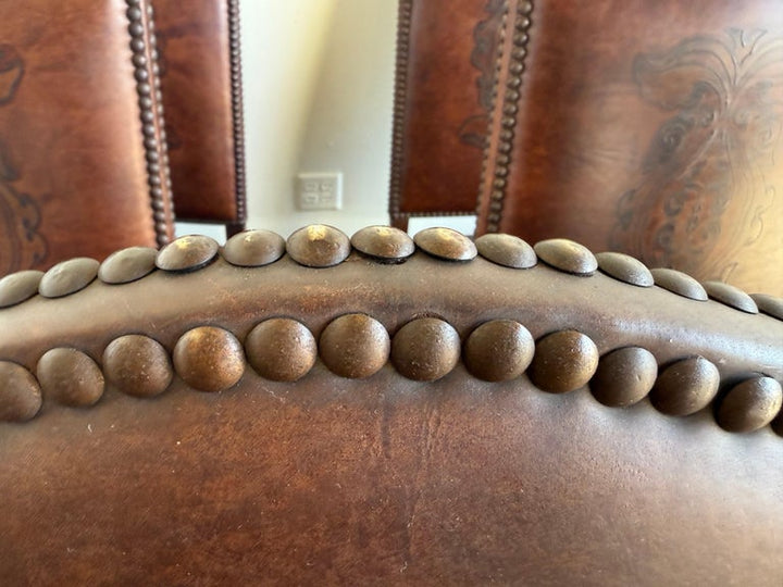 Set of Eight Spanish Revival Leather and Carved Walnut Dining Chairs