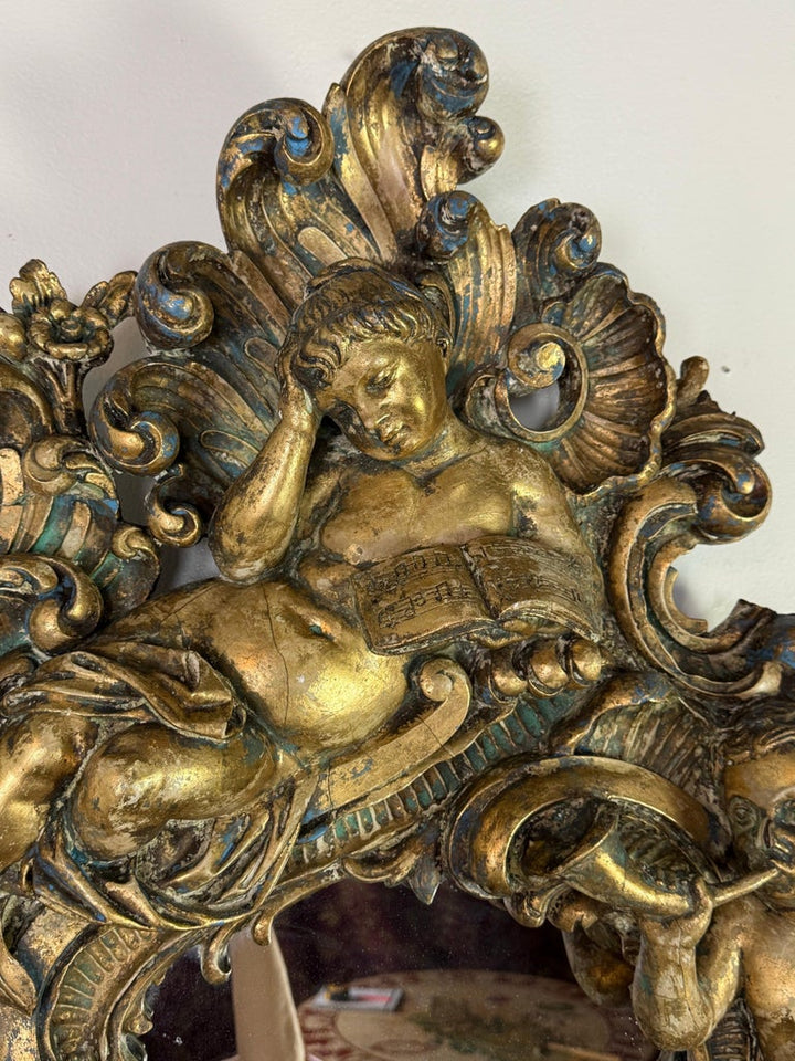 19th Century Italian Rococo Giltwood Figural Mirror