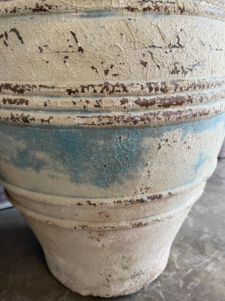 Pair of Large Distressed Mediterranean Style Terracotta Olive Jars with Handles