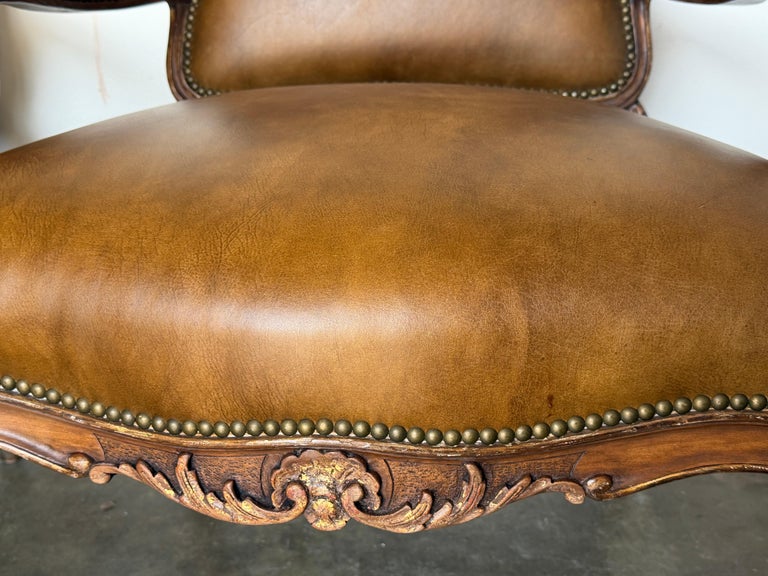 Pair of VIntage French Louis XV Cognac Leather Fauteuils