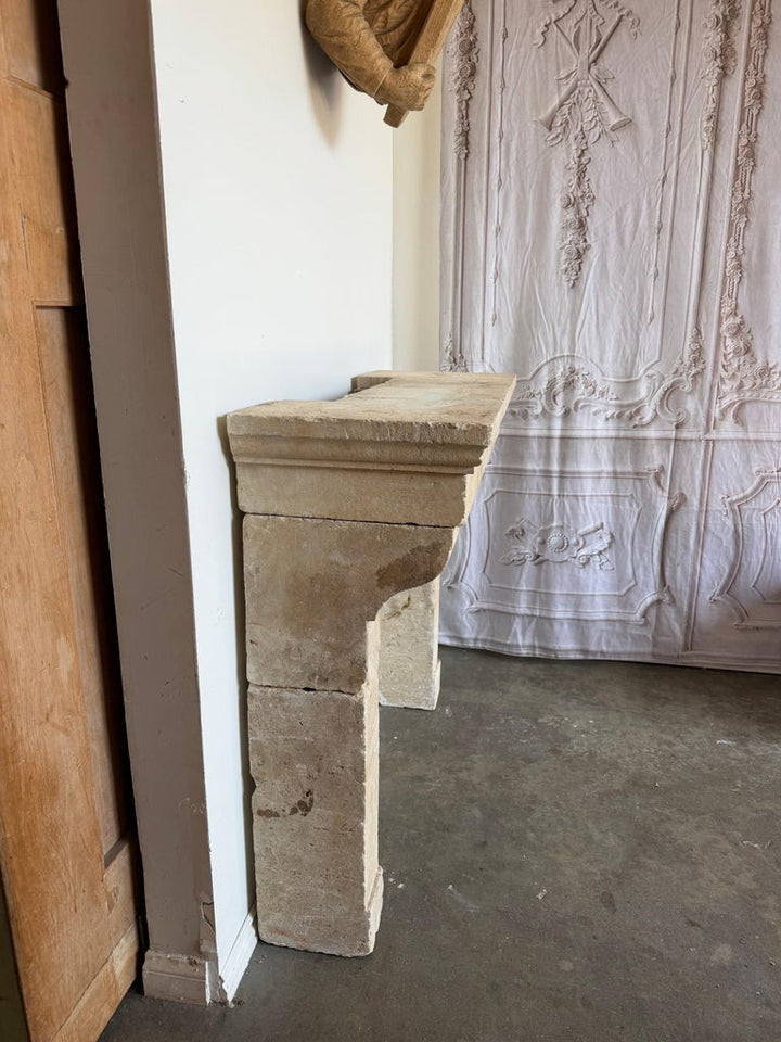 Petite 18th Century French Limestone Fireplace Mantel With Scrolled Corbels