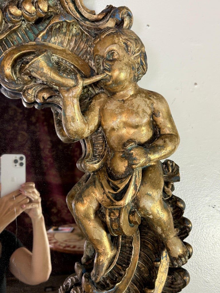 19th Century Italian Rococo Giltwood Figural Mirror