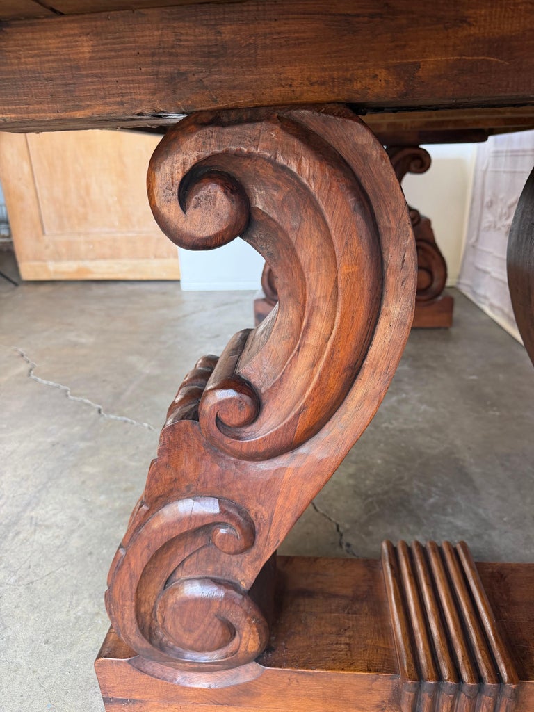 Spanish Colonial Revival Walnut Dining Table with Hand-Carved Scrollo