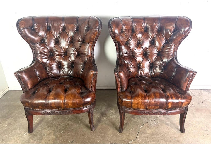 Pair of 19th Century English Leather Tufted Armchairs