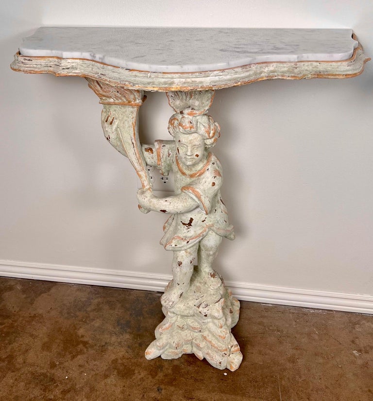 Pair of Cherub Consoles with Marble Tops, circa 1930s