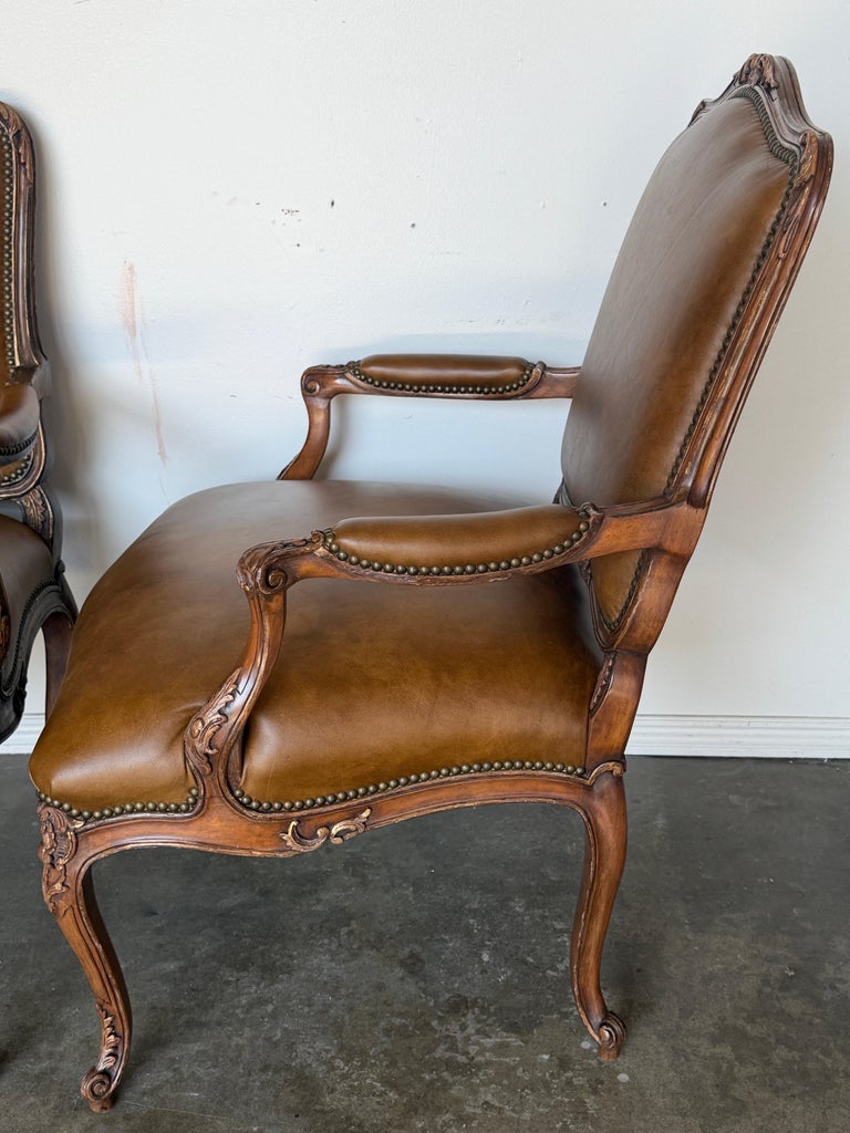 Pair of VIntage French Louis XV Cognac Leather Fauteuils
