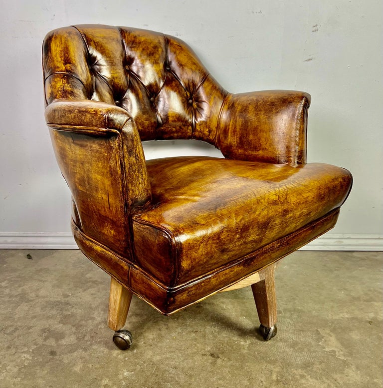 Pair of Mid-Century Leather Tufted Armchairs on Swivels