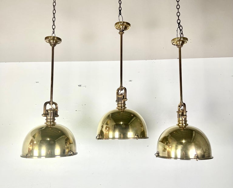 Set of Three Monumental Brass Domed Shaped Pendants