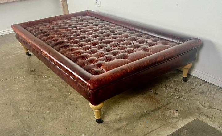 English Leather Tufted Ottoman on Casters