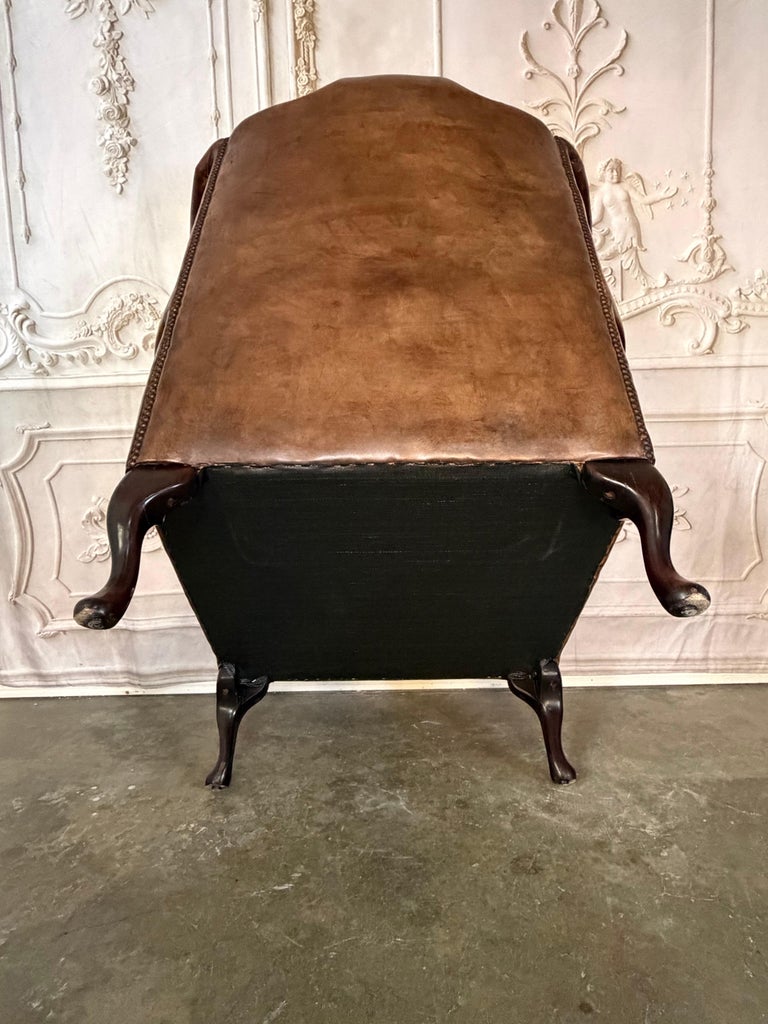 Pair of Vintage English Tufted Leather Wingback Armchairs