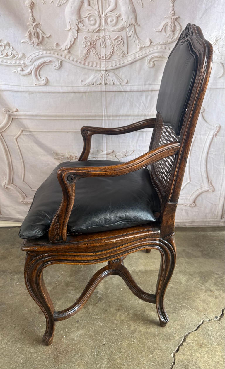 Eight French Provincial-style dining chairs