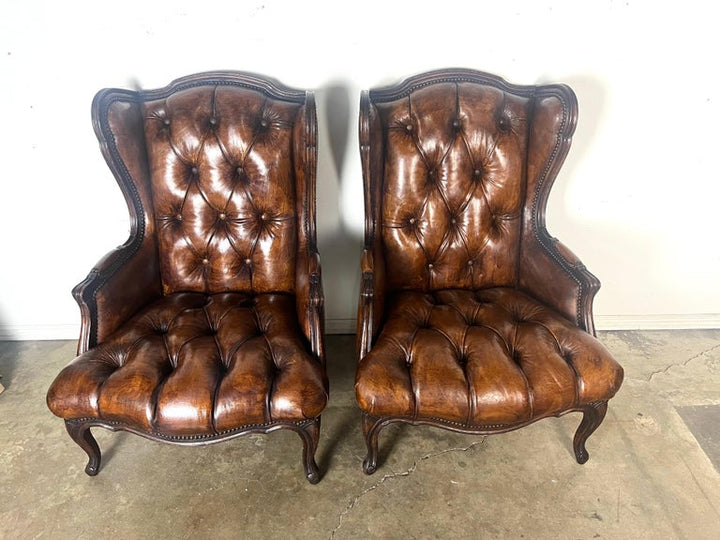 Pair of French Leather Tufted Wingback Chairs C. 1930