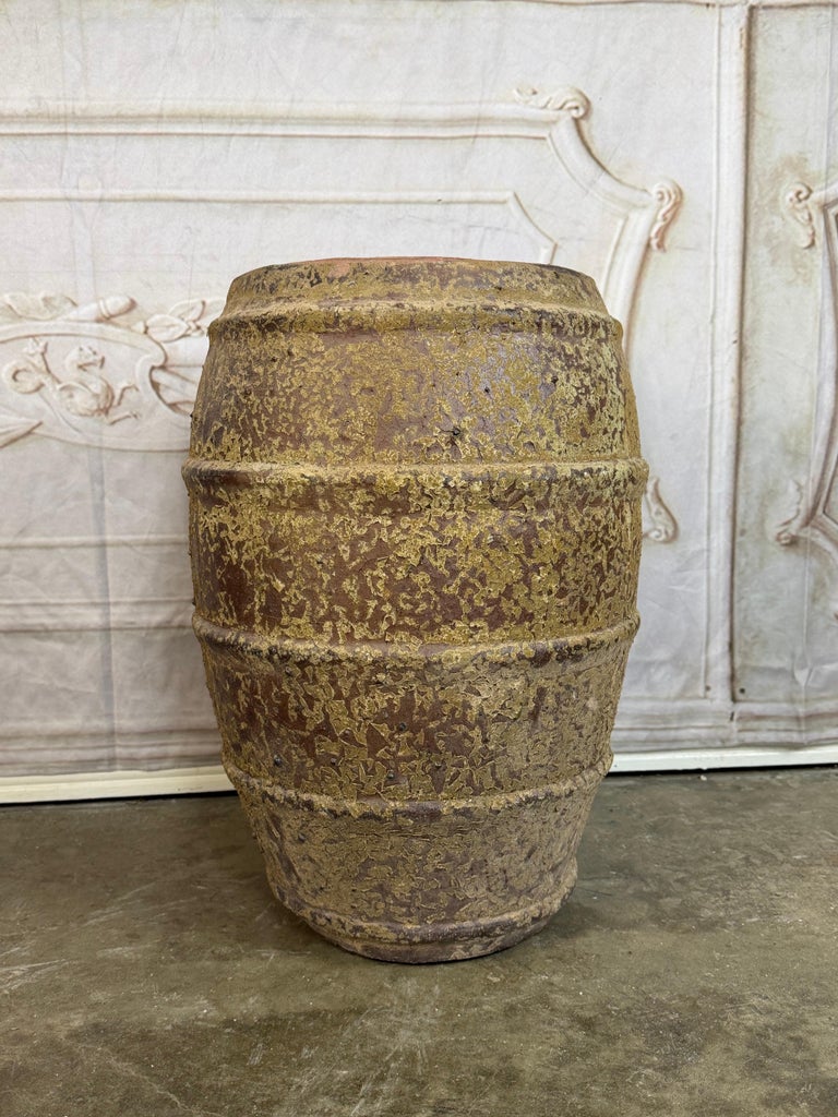 Ribbed Terracotta Storage Vessel with Ochre Encrusted Patina