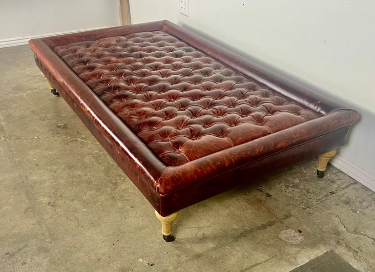 English Leather Tufted Ottoman on Casters