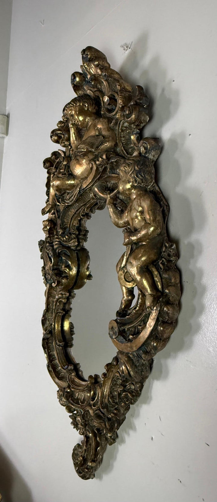 19th Century Italian Rococo Giltwood Figural Mirror
