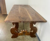 Handcrafted Solid Wood Trestle Dining Table with Wrought Iron Stretcher
