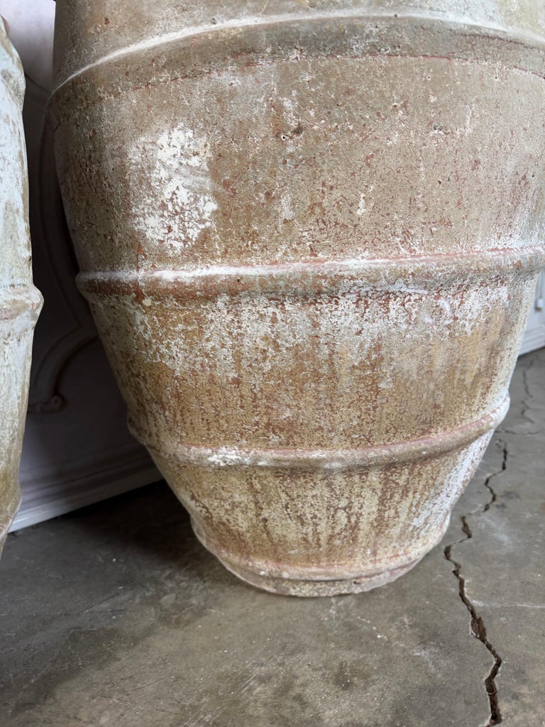 Pair of Antique Mediterranean Terracotta Storage Jars with Weathered Patina