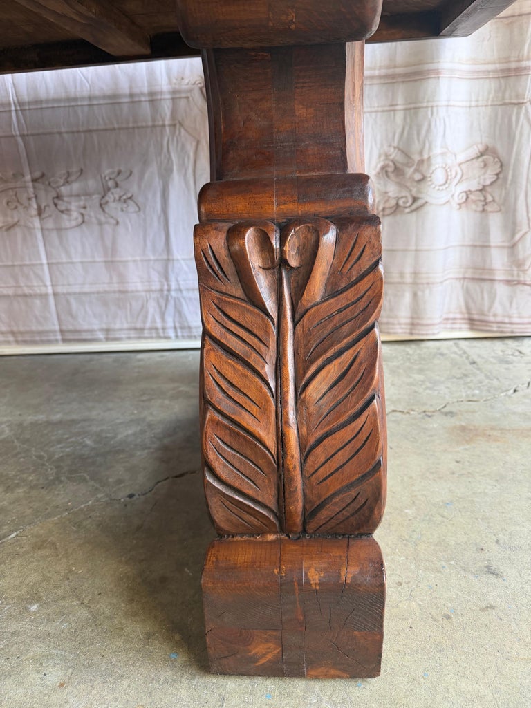 Spanish Colonial Revival Walnut Dining Table with Hand-Carved Scrollo