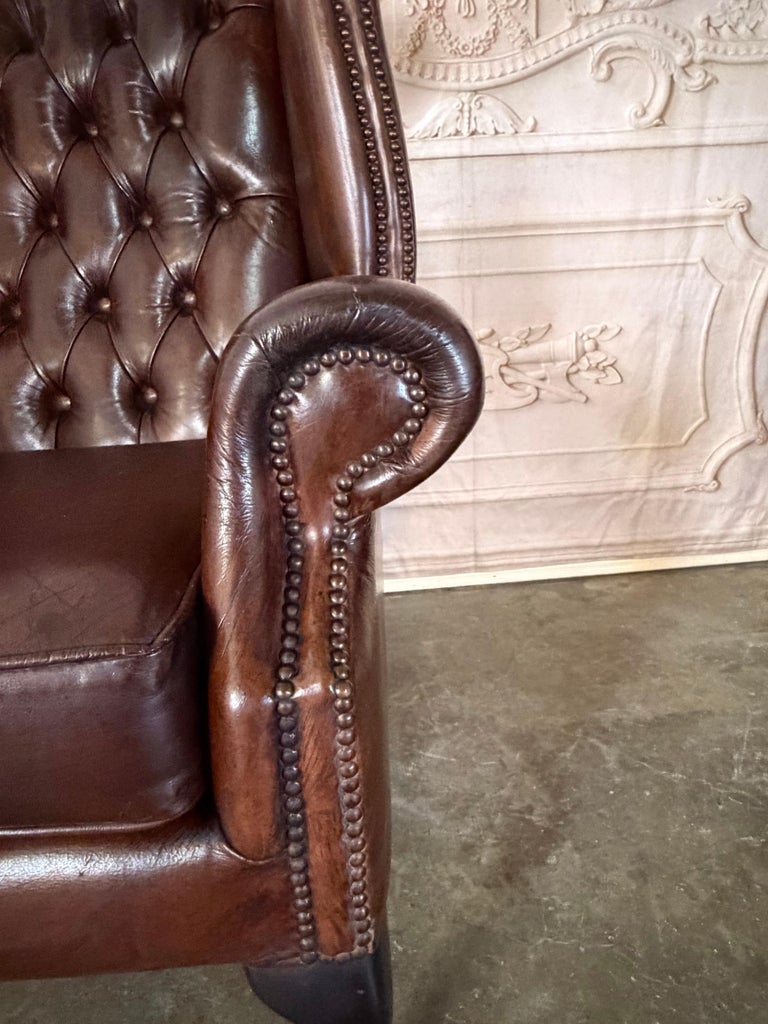 Pair of Vintage English Tufted Leather Wingback Armchairs